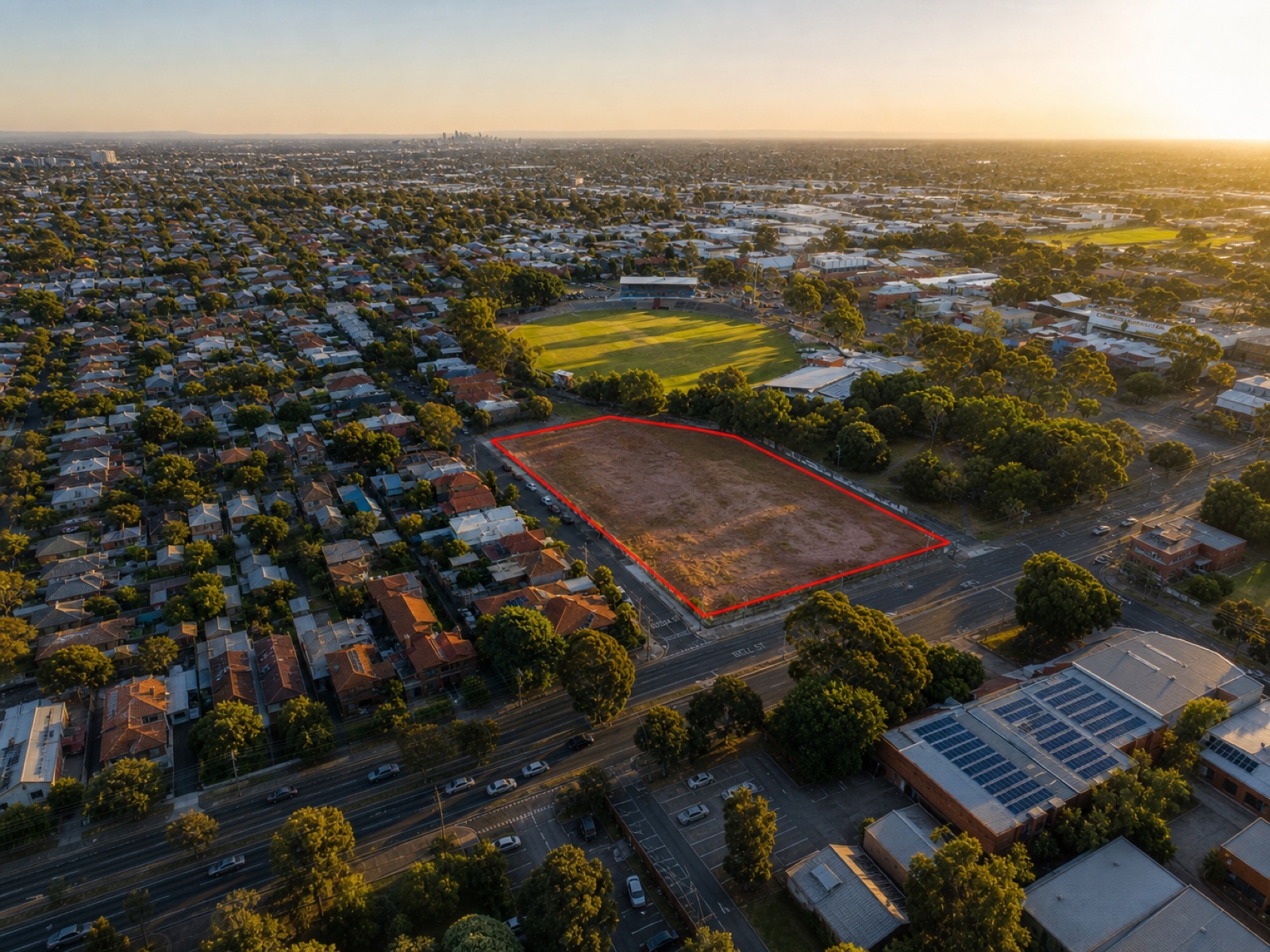 Drone aerial of the empty Coburg site — reference
