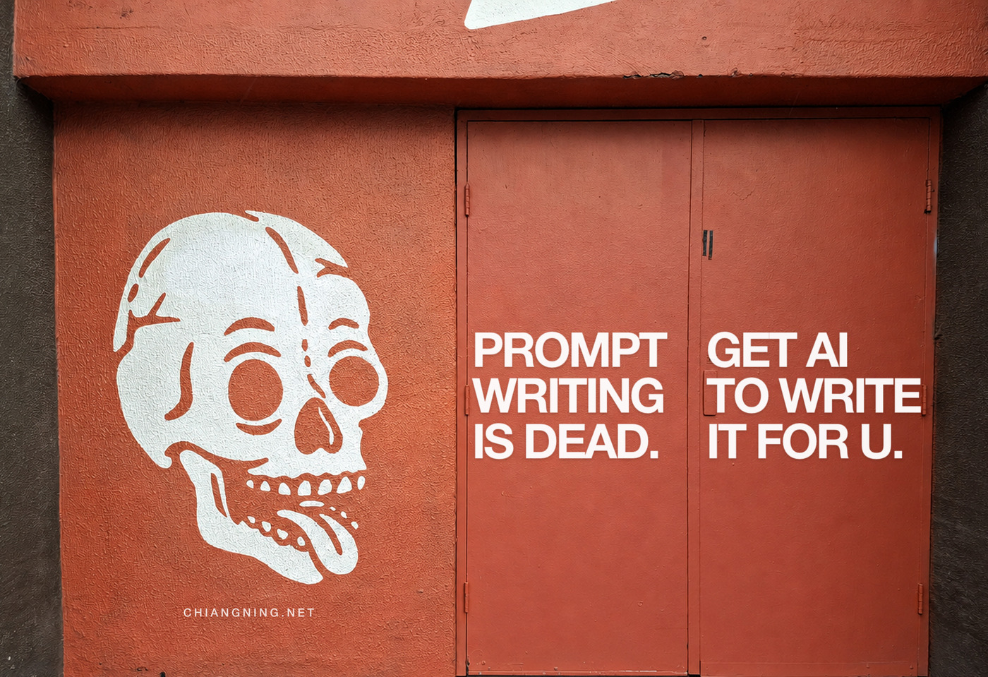 The upper panel on its own: a red painted wall with a white stencilled skull, and PROMPT WRITING IS DEAD painted across the left roller-door leaf with GET AI TO WRITE IT FOR U. across the right.